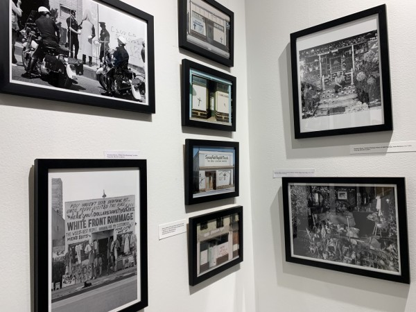 8 framed black and white photos in a corner