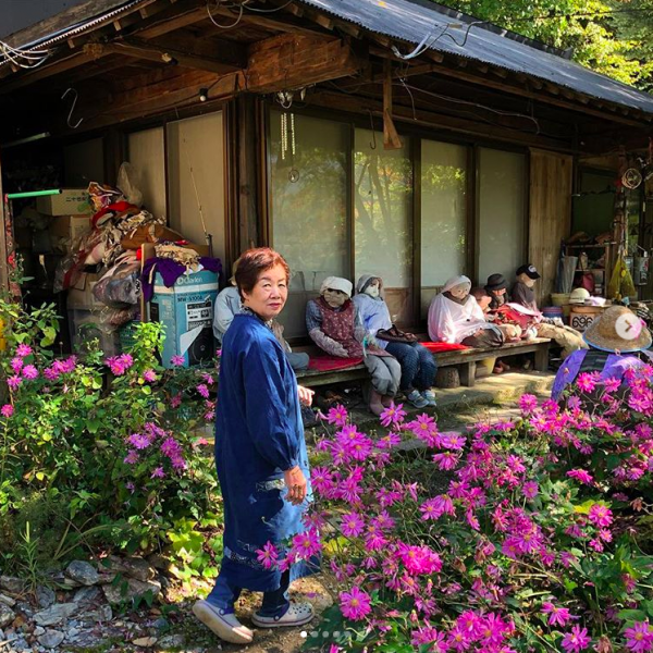 Tsukimi Ayano with some of her neighbors in Nagoro, Japan. Image courtesy of Adam H. Graham. 