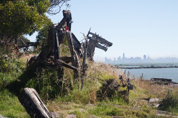 The Bulb - wooden sculpture with cityscape of Los Angeles in the distance