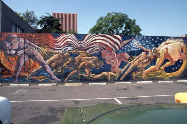 A mural with several people holding a chain.